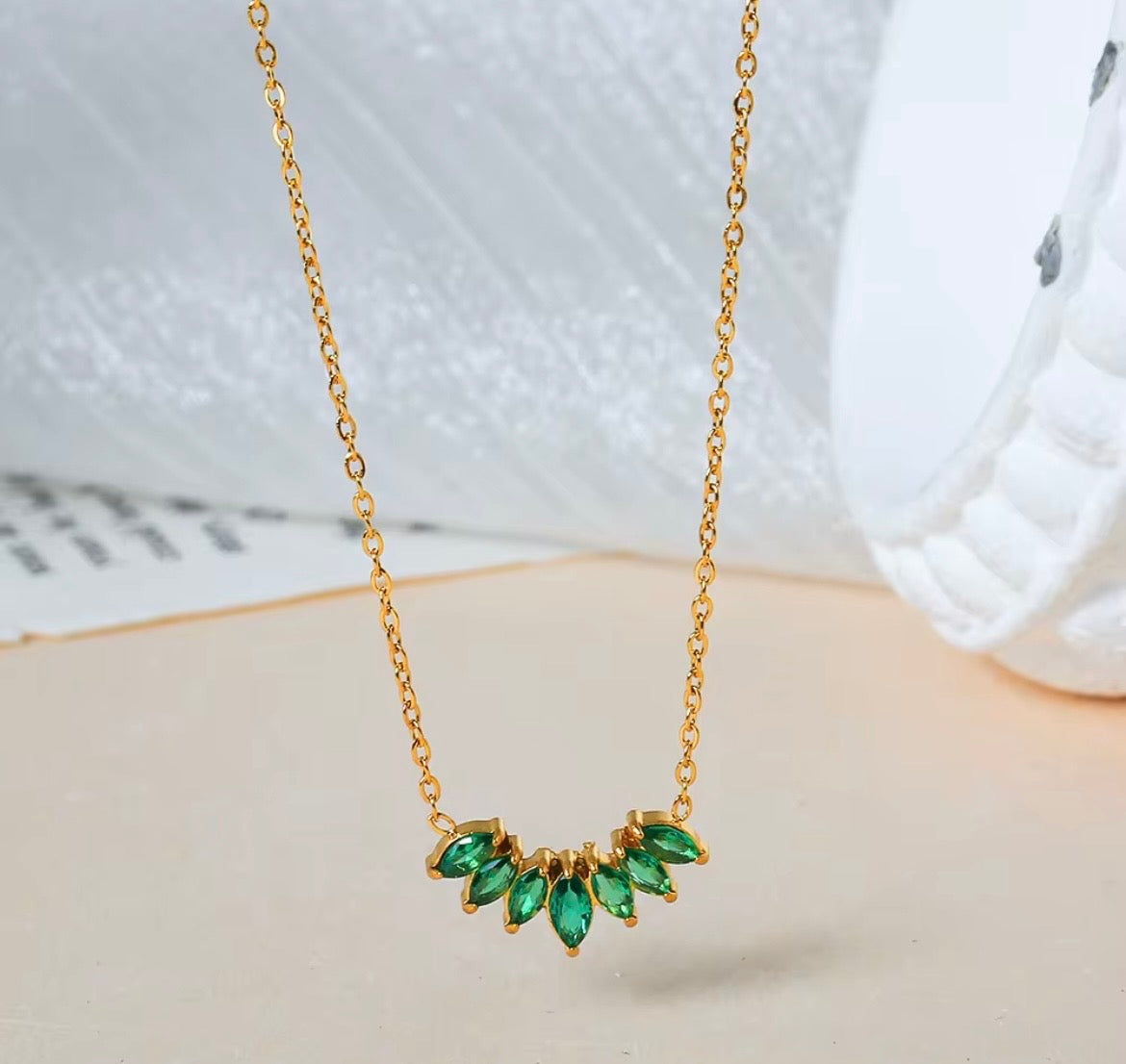 Emerald sun necklace